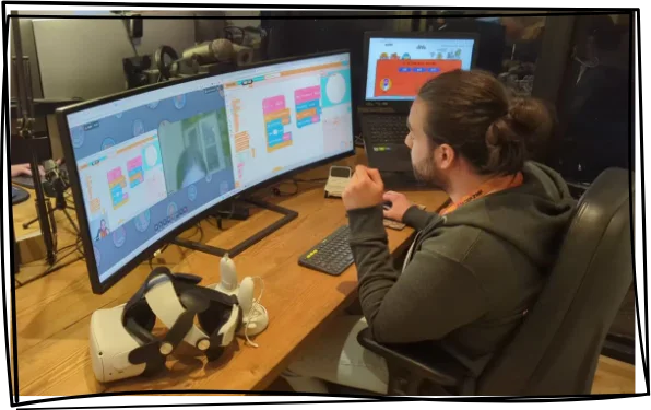 A Code Zone mentor running an online coding session